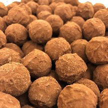 A tray of chocolate truffles